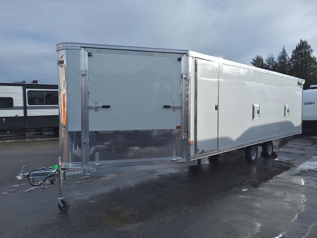 ED578FCD-F58C-4249-A274-2DFCBC25E4D9-1.jpg 2024 Mission Trailers 101x24 Aluminum 4/5 Place Drive In/Out Deckover - Image 1